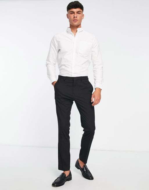 White long sleeve store shirt with black pants