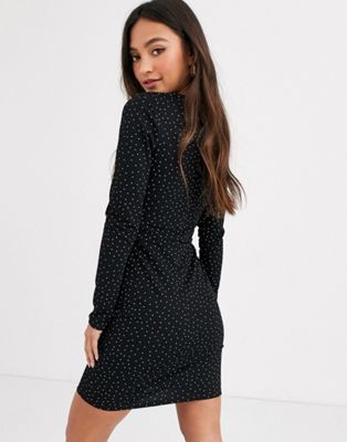 black dress with polka dot sleeves