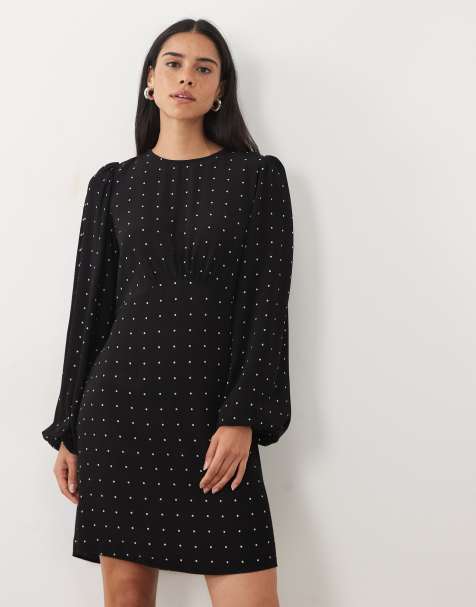 New Look long sleeved flippy mini dress in black polka dot - view 1