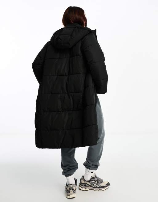 New Look longline puffer coat with hood in black ASOS