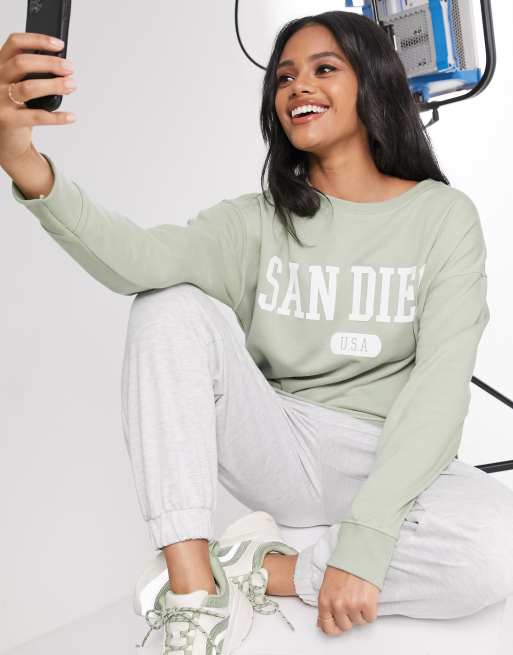 New Look longline slogan sweatshirt in light green ASOS