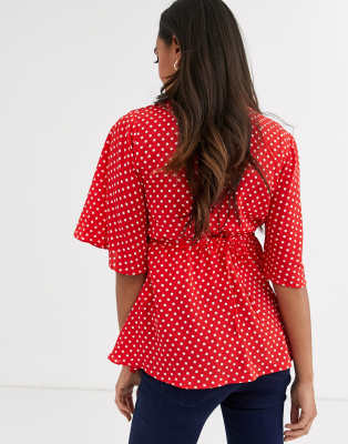 red polka dot peplum top