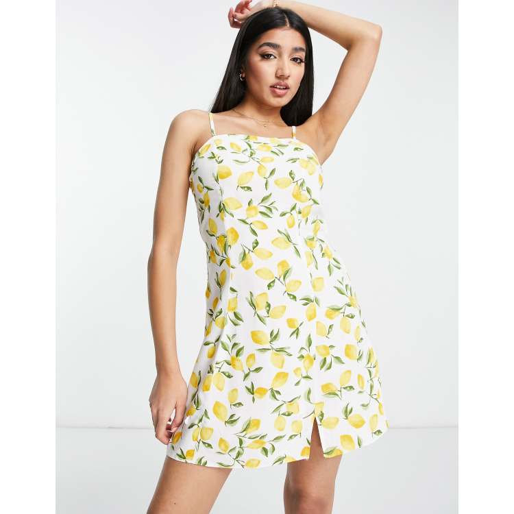 Buy Yellow/White Button Through Mini Slip Dress from Next Luxembourg