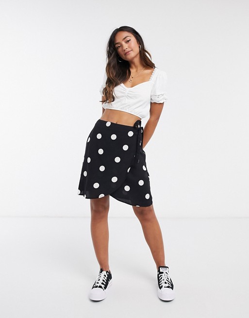 New Look mini wrap skirt in black polka dot
