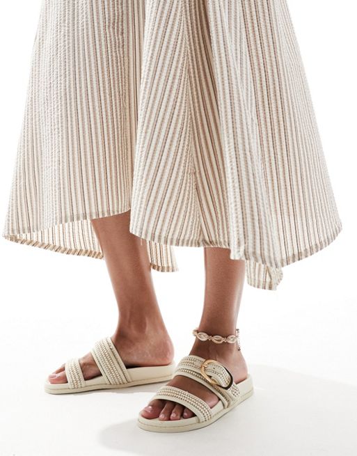 New Look – Naturvita, platta sandaler med remmar i raffia