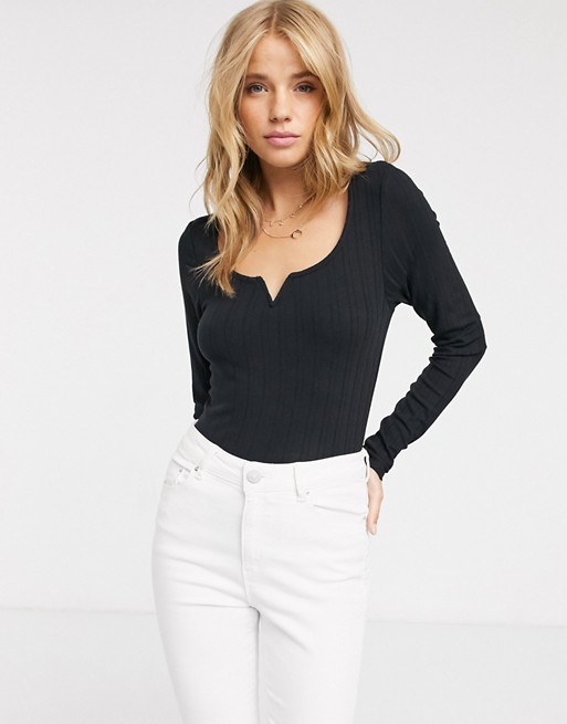 New Look notch detail long sleeve ribbed top in black