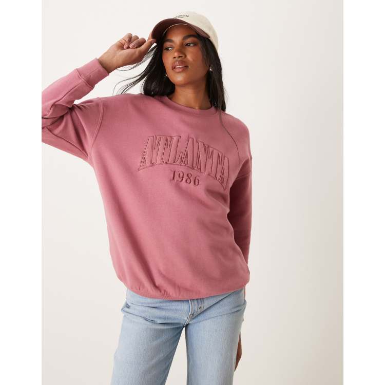 New Look oversized jumper with Atlanta slogan in pink ASOS