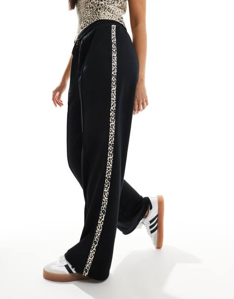 New Look - Pantalon de jogging à bandes latérales imprimées léopard - Noir - view 1