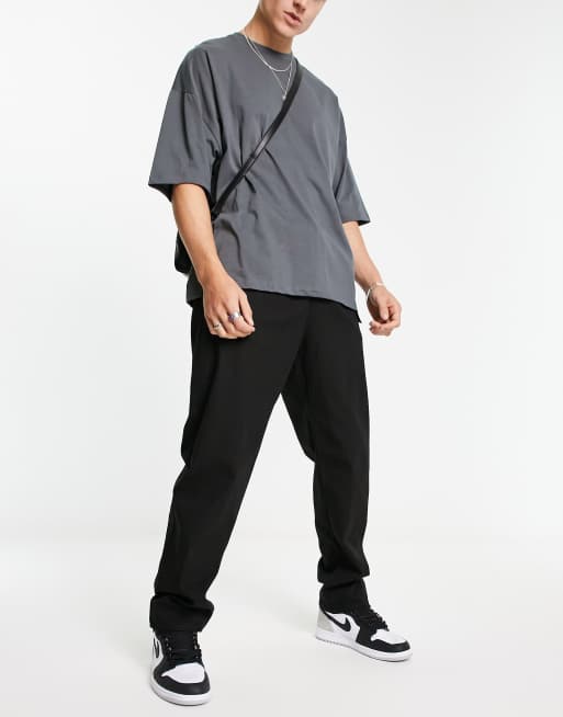 New Look - Pantaloni multitasche neri con cintura con chiusura a clip