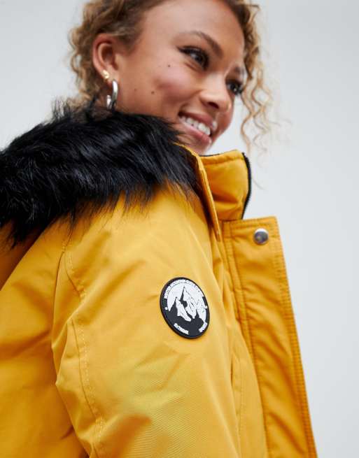 Mustard yellow coat with fur clearance hood