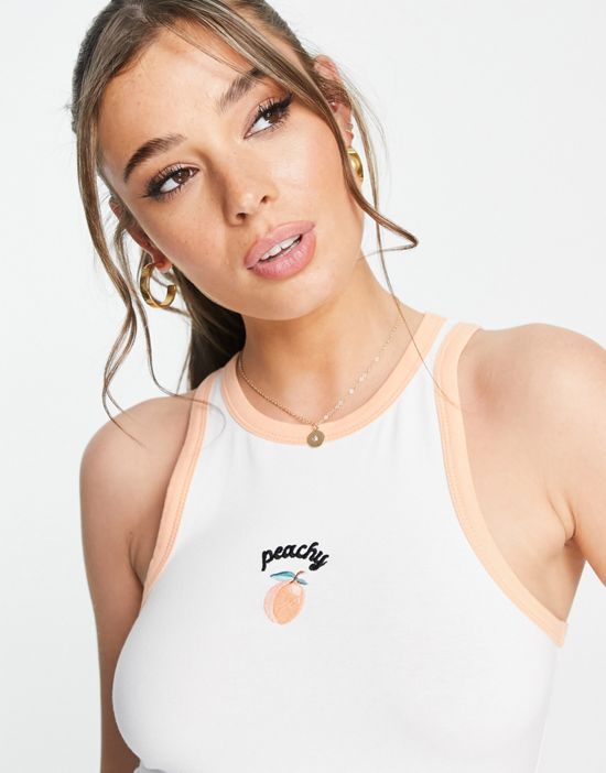 https://images.asos-media.com/products/new-look-peach-slogan-racer-tank-top-in-white/202733795-3?$n_550w$&wid=550&fit=constrain