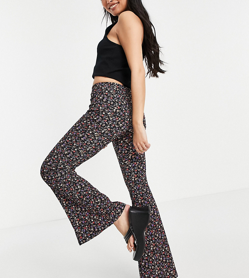 New Look Petite jersey flare trouser in floral print-Black