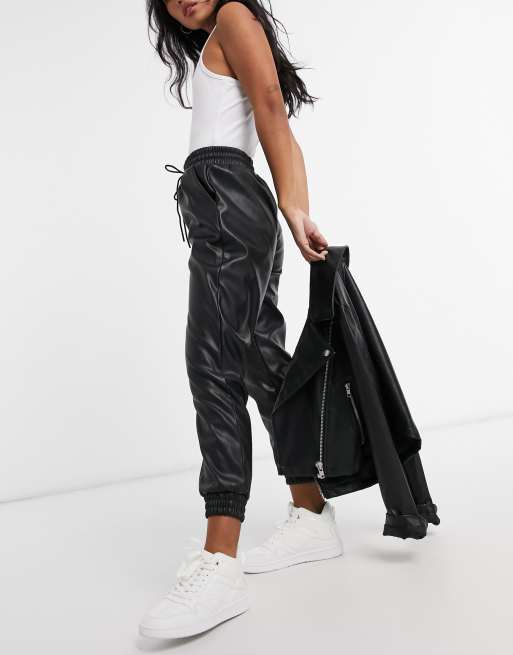 New Look Petite leather look jogger in black