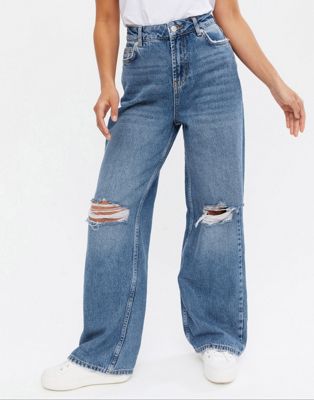 New Look Petite wide leg dad jeans with ripped knees in mid blue