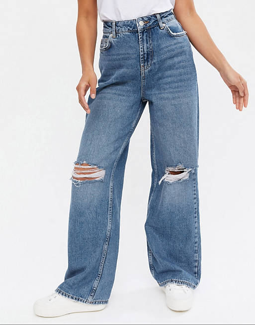  New Look Petite wide leg jeans with ripped knees in mid blue 
