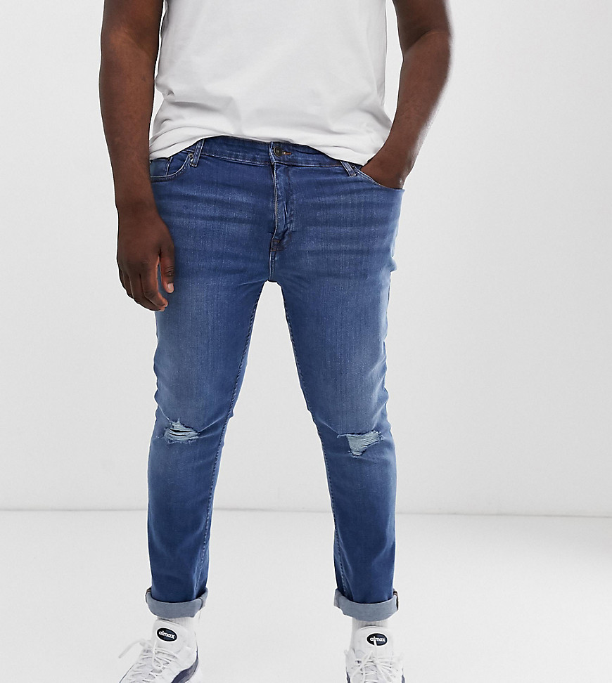 New Look Plus - Skinny jeans met scheuren in blauw met wassing