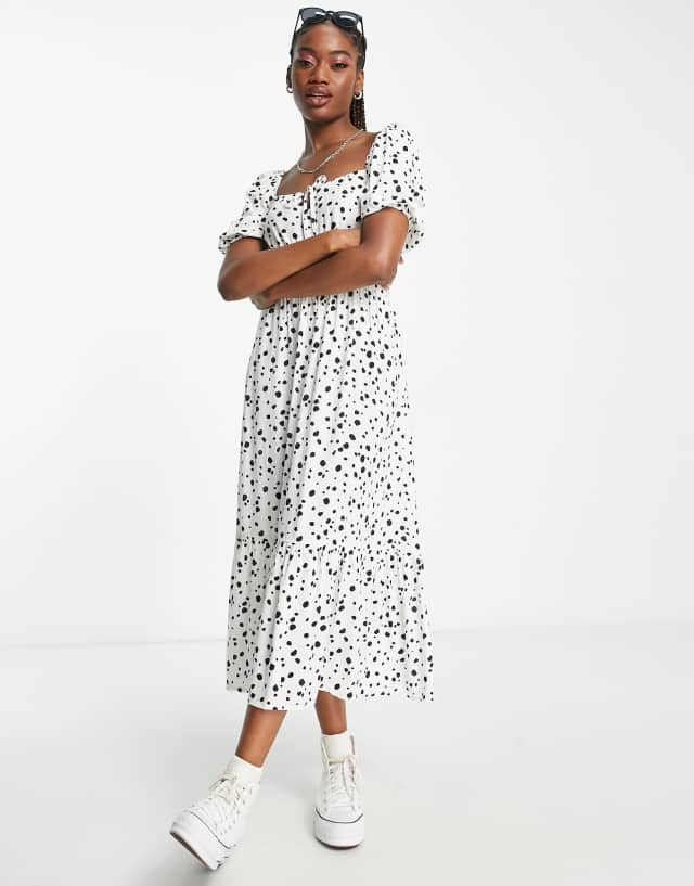 New Look puff sleeve tiered midi dress in black dot print