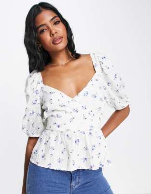 New Look puff sleeve wrap peplum blouse in white floral