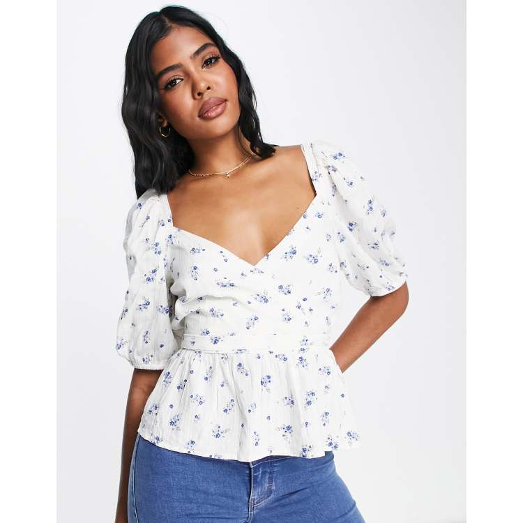 New Look puff sleeve wrap peplum blouse in white floral