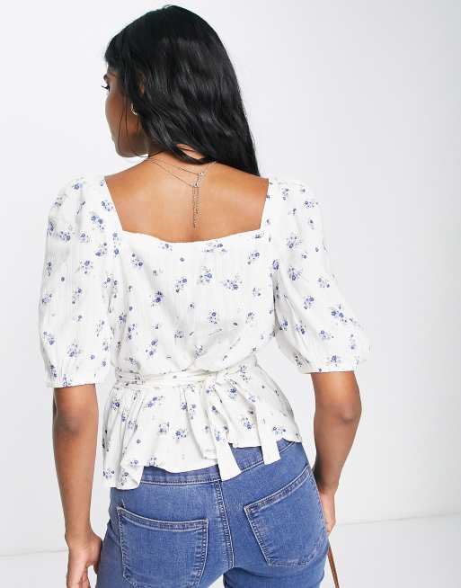 New Look puff sleeve wrap peplum blouse in white floral