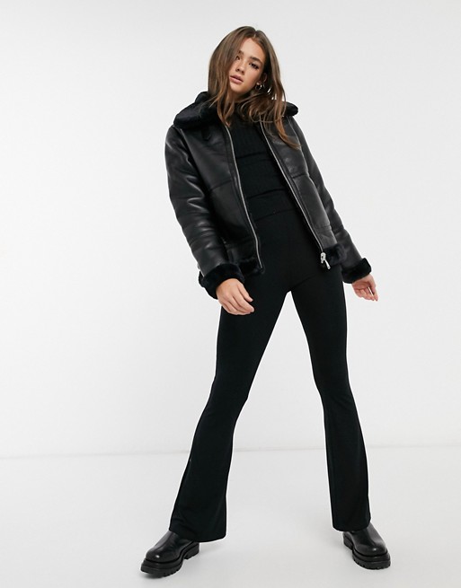 New Look reversible leather look faux fur aviator in black