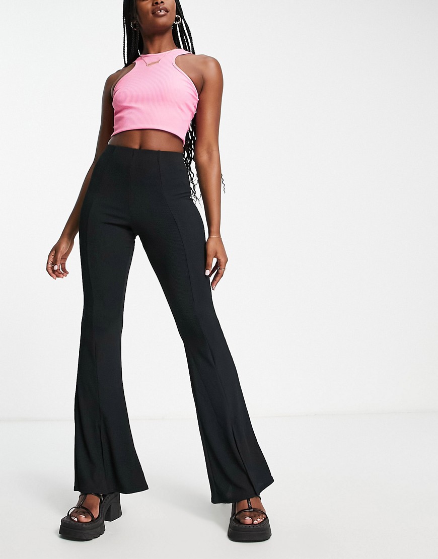 New Look ribbed split front flare trousers in black