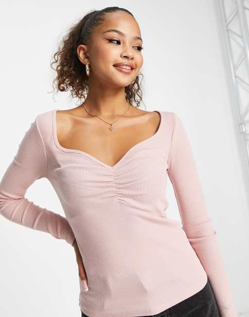 pink v neck long sleeve top