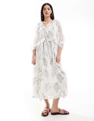 New Look ruffle front chiffon maxi dress in cream floral-White
