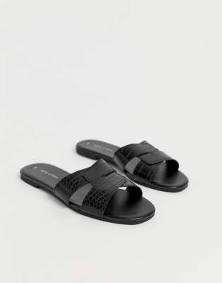 mules plates noires