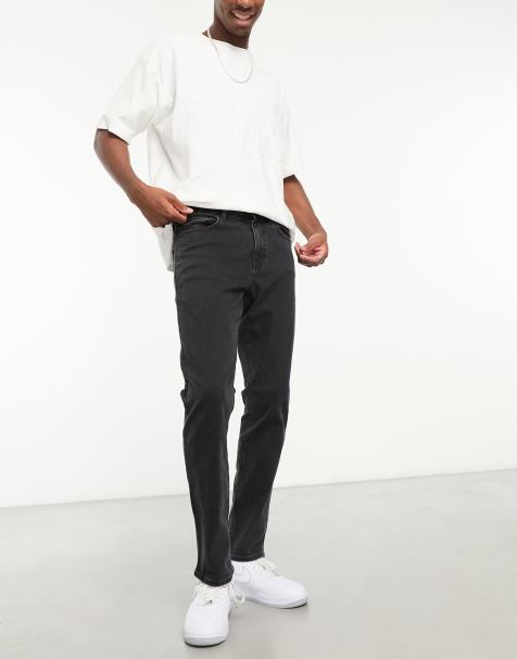 New Look – Schmal geschnittene Jeans in verwaschenem Schwarz - view 1