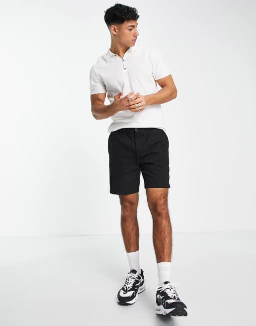 White polo store with shorts