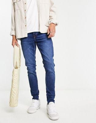 New Look skinny jeans in dark blue - ASOS Price Checker