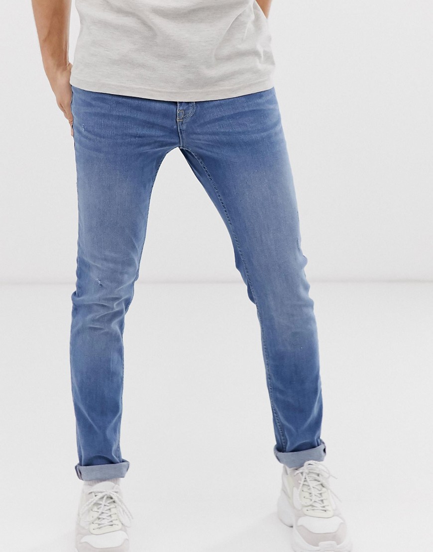New Look skinny jeans in mid blue wash