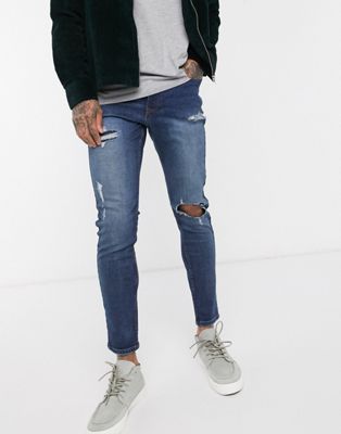 New Look – Skinny-Jeans in mittlerer Waschung mit Flickendesign-Blau