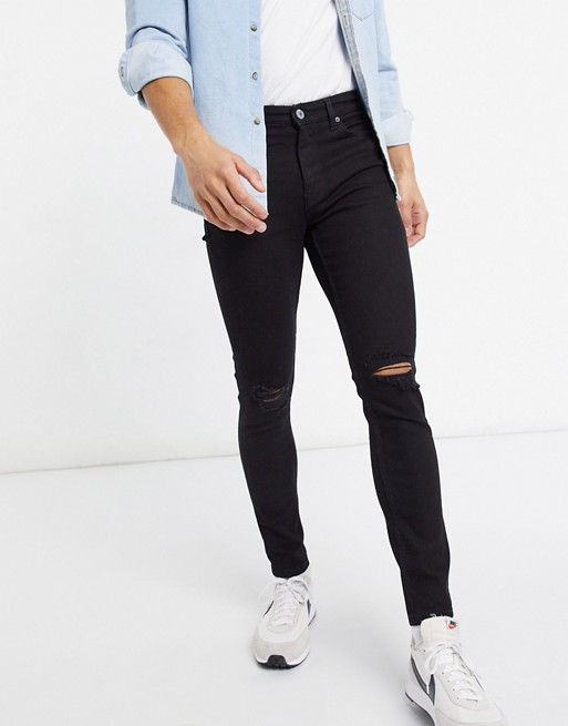 New Look skinny jeans with knee rips in black | ASOS