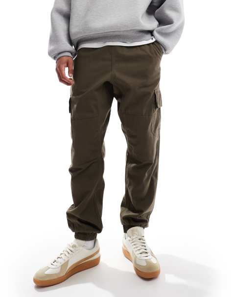 New Look – Slim Fit Cargohose in dunklem Khaki mit Bündchen - view 1