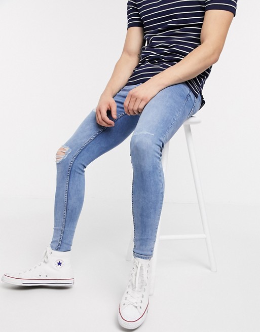 New Look spray on ripped jeans in mid wash blue