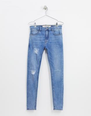 spray on ripped jeans