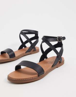 black strappy flat sandals