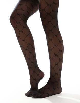New Look - Strumpfhose in Schwarz mit Monogramm-Print