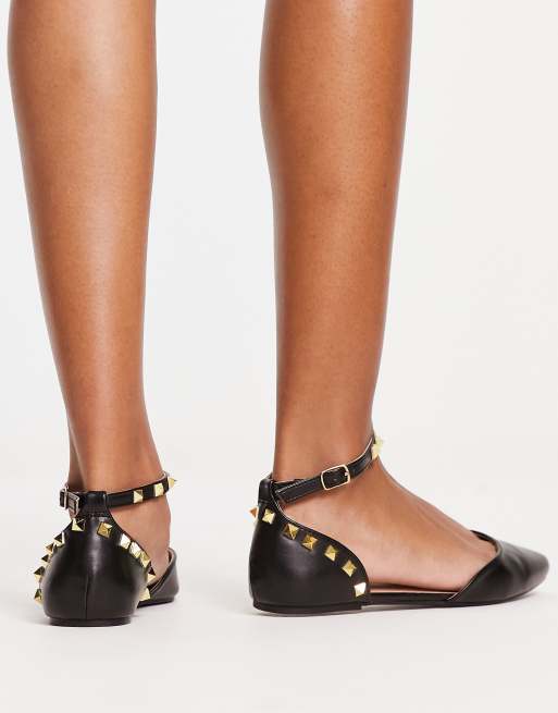 Black studded flat store shoes