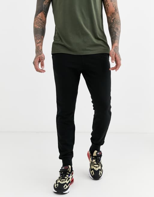 light pink shirt with black pants