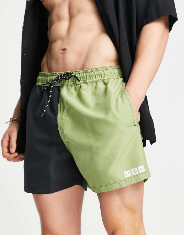 New Look swim shorts in color block green and black