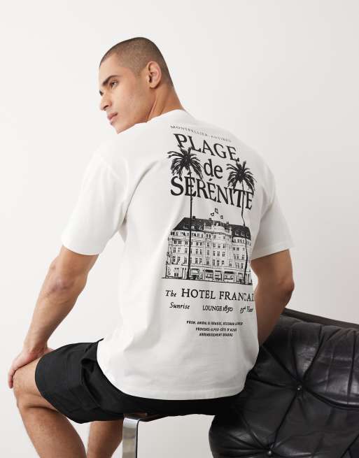 New Look - T-shirt oversize color crema con logo e stampa di hotel