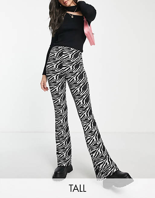 Trousers & Leggings New Look Tall marble print flare trousers in black 