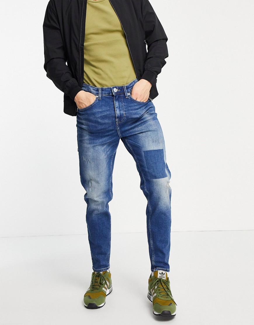 New Look tapered jeans in blue wash-Blues