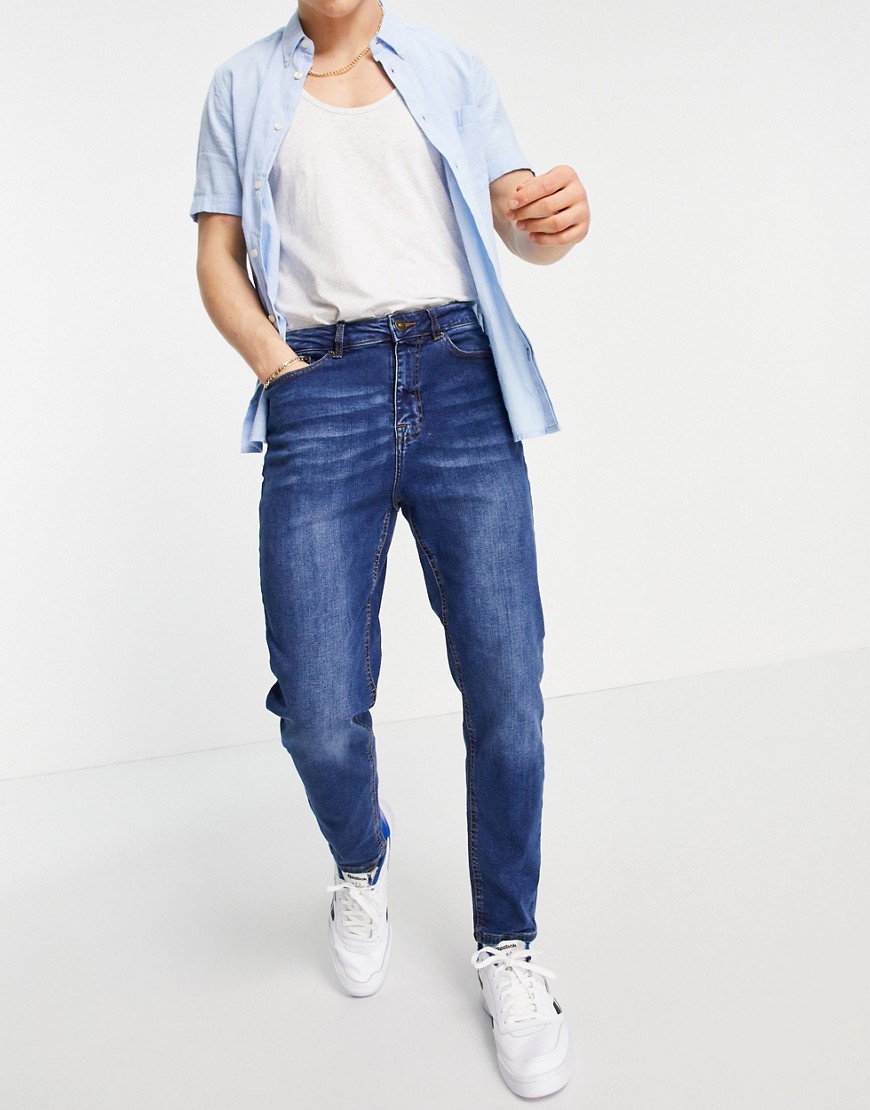 New Look tapered jeans in mid blue wash-Blues