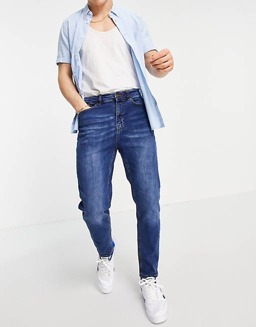 New Look tapered jeans in mid blue wash