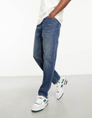 New Look tapered jeans in mid blue | ASOS