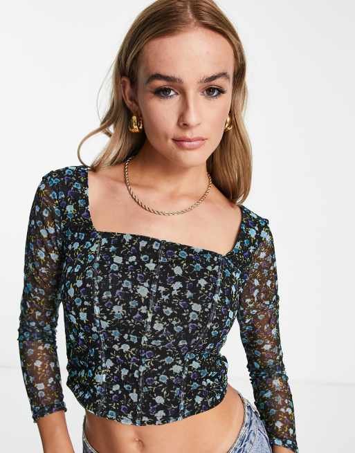 New Look - Top a corsetto nero con motivo a fiori e maniche lunghe in rete